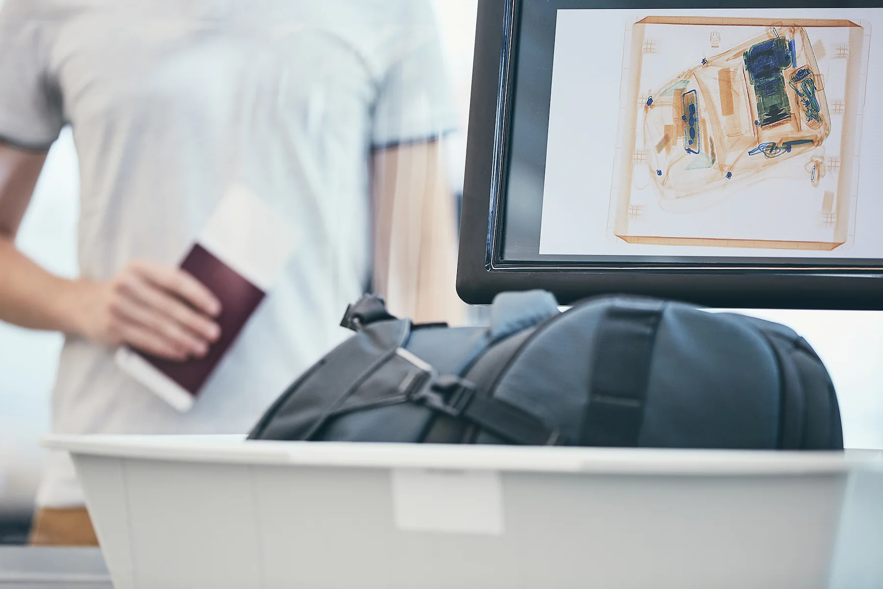 Airport security checkpoint with X-ray screening equipment